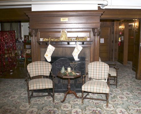 Fireplace seating area in a common room